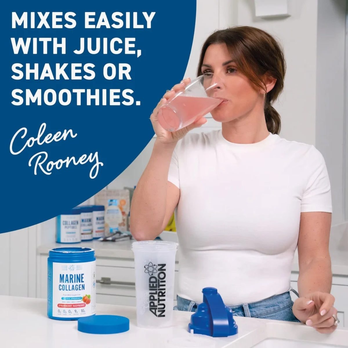 Woman drinking a pink smoothie with collagen products on a kitchen counter, featuring Coleen Rooney's endorsement.